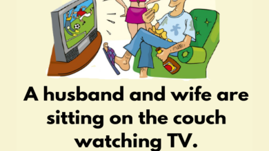 A husband and wife are sitting on the couch watching TV e1726126779910